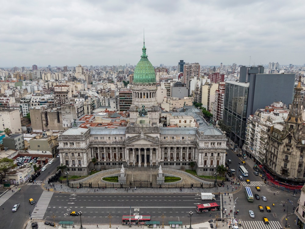 Photo by Nestor Barbitta cars on road near city buildings during daytime